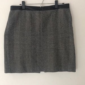 Herringbone skirt with faux leather waistband